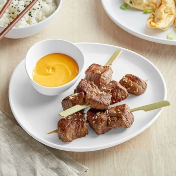 GET Riverstone 9 1/8" White Irregular Round Matte Melamine Coupe Plate - 12/Pack