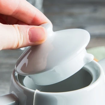 Tuxton GZP-102L TuxTrendz Porcelain White China Teapot Lid - 12/Case