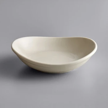 Tuxton BEB-105J 10.5 oz. Eggshell Oval China Bowl - 12/Case