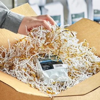 Lavex 10 lb. Crinkle Paper Shred Gold and White Metallic Blend