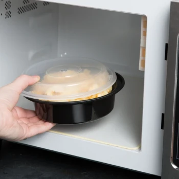 Pactiv Newspring NC718B 16 oz. Black VERSAtainer Round Microwavable Container with Lid - 150/Case