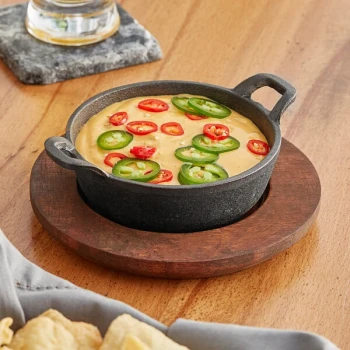 Valor 12 oz. Pre-Seasoned Mini Cast Iron Round Serving Bowl with Rustic Chestnut Finish Rubberwood Underliner