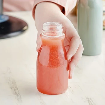 Captiva Containers 8 oz. Round PET Clear Juice Bottle with Tapered Neck - 320/Case