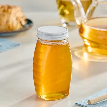 5.5 oz. (8 oz. Honey Weight) Classic Queenline Glass Honey Jar with Plastisol-Lined White Metal Lid - 96/Case