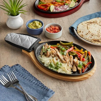 Choice 9 1/4" x 7" Oval Pre-Seasoned Cast Iron Fajita Skillet with Natural Finish Wood Underliner and Gray Silicone Coated Handle Cover