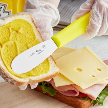Choice 3 1/2" Smooth Stainless Steel Sandwich Spreader with Neon Yellow Polypropylene Handle