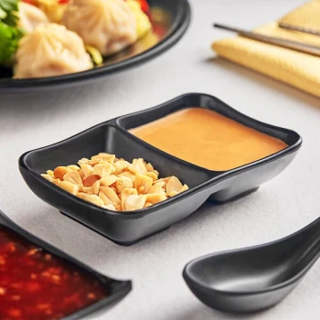 Acopa Izumi 3 oz. Matte Black Two Compartment Melamine Sauce Dish - 12/Pack
