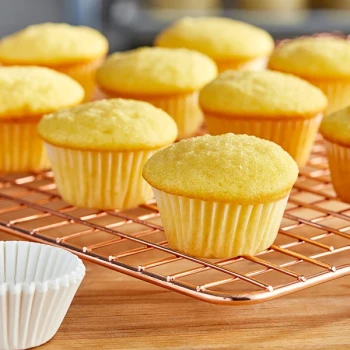 Wilton 1 1/2'' x 7/8'' White Mini Baking Cup - 100/Pack