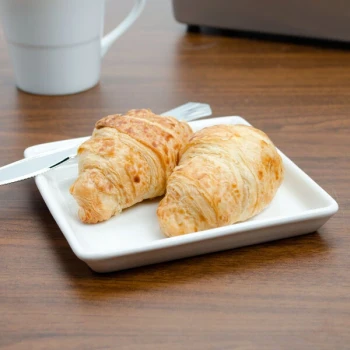 Tuxton AMU-502 AlumaTux Pearl White (European White) 5 5/8" x 5 5/8" x 5/8" Square China Plate - 24/Case