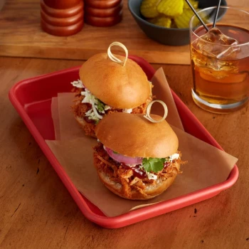 Baker's Lane Eighth Size 19 Gauge Non-Stick 6 1/2 inch x 9 1/2 inch Red Wire in Rim Aluminum Bun / Sheet Pan / Tray