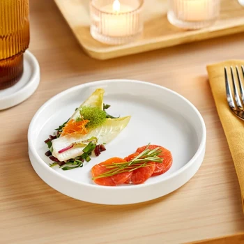 Acopa Lore 6 1/4 inch Bright White Raised Rim Porcelain Plate - Sample