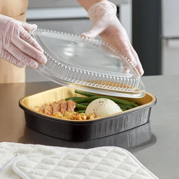 Choice Heavy Duty Smoothwall Black and Gold Large Oblong Foil Entree / Take-Out Pan with Dome Lid 65.6 oz. - 50/Case