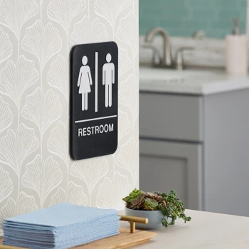 Lavex 9" x 6" Black / White Plastic Unisex Restroom Sign with Braille - 6/Case