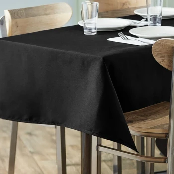 Choice 54" x 110" Rectangular Black Seamless 100% Spun Polyester Hemmed Cloth Table Cover