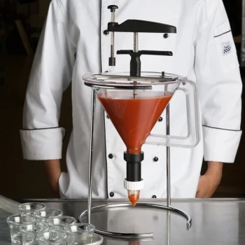 Matfer Bourgeat 116605 1.5 Qt. (48 oz.) Polycarbonate Portion Control Funnel with Chrome-Plated Wire Stand