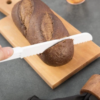 Fineline 3303-WH Platter Pleasers 11 1/2" White Plastic Bread Knife - 48/Case