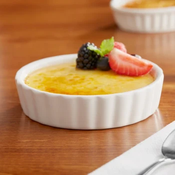 Acopa 8 oz. Round Ivory Fluted Porcelain Souffle / Creme Brulee Dish - 36/Case