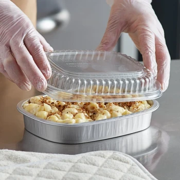 Choice Heavy Duty Smoothwall Silver Small Oblong Foil Take-Out Pan with Dome Lid 23.3 oz. - 100/Case