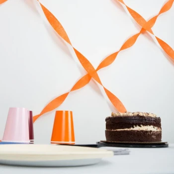 Creative Converting 078560 81' Sunkissed Orange Streamer Paper - 12/Case