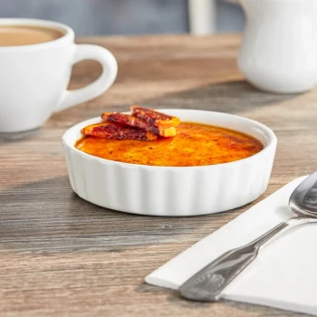 Acopa 8 oz. Round Bright White Fluted Porcelain Souffle / Creme Brulee Dish - 36/Case