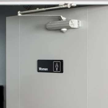 Vollrath 4516 Traex® Women's Restroom Sign - Black and White, 9" x 3"