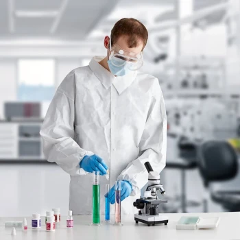 Lavex White 53 GSM Heavy Weight Microporous Polypropylene Snap Front Long Sleeve Lab Coat with Elastic Wrists - L - 30/Case